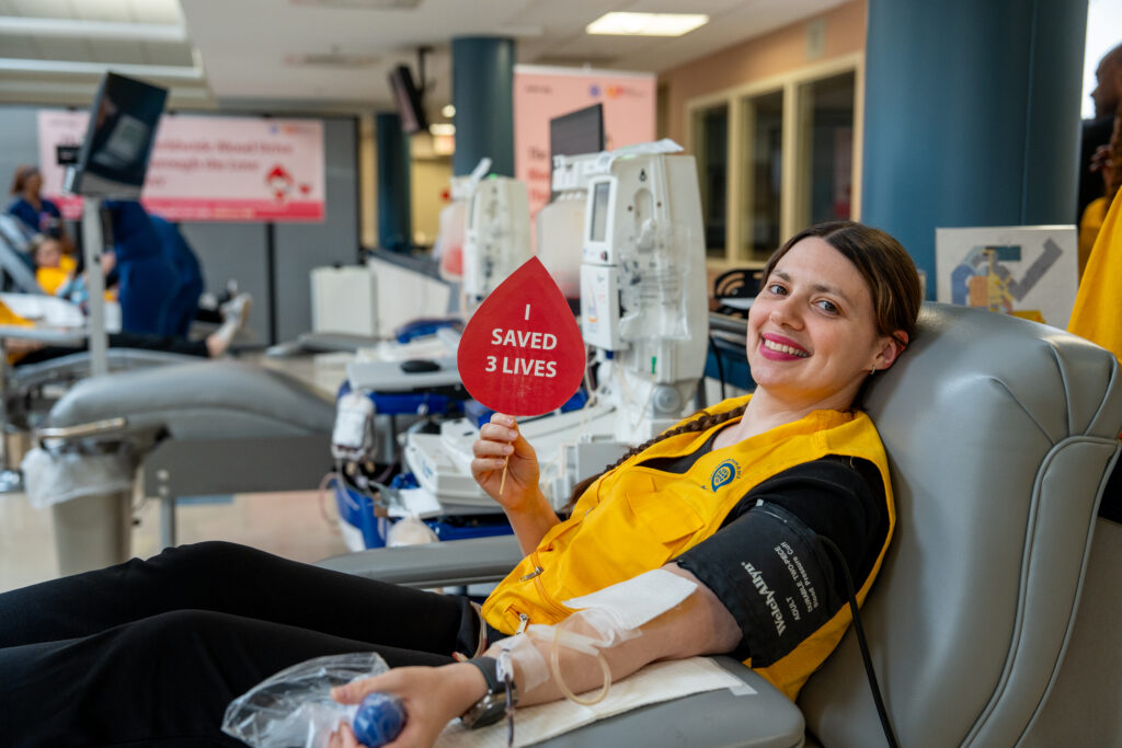 Close up of a donor giving blood to save lives.